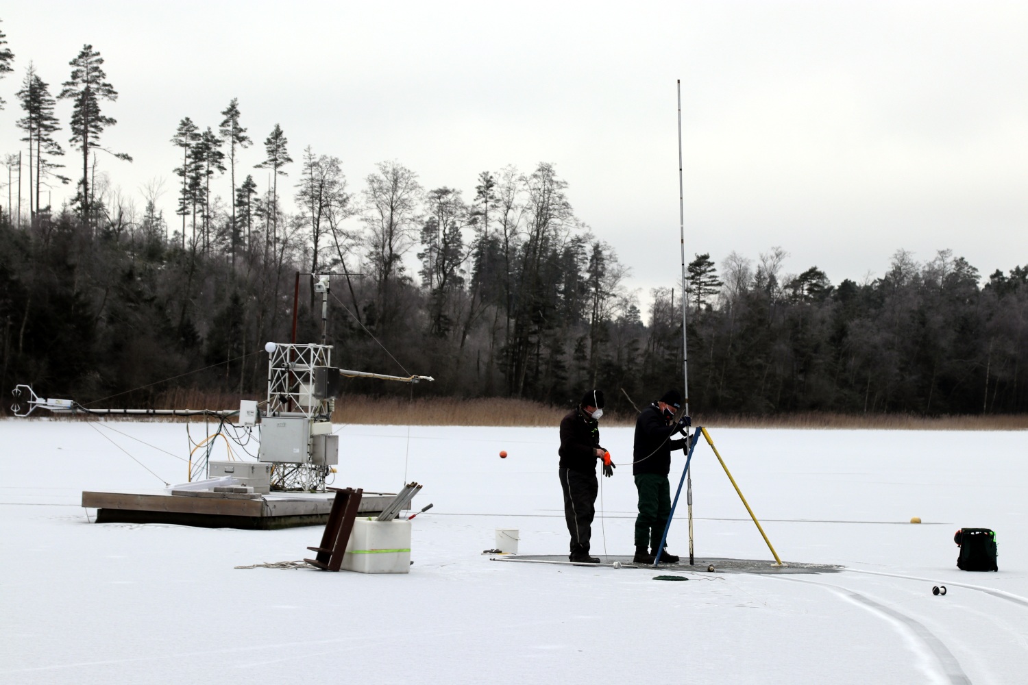 Two master students, Fredrik Andersson and Tobias Möhl, participated in the sampling. Here they are pulling the geo-radar (Malå Geoscience Ramac) equipment over the ice. Photo: Leif Klemedtsson.
