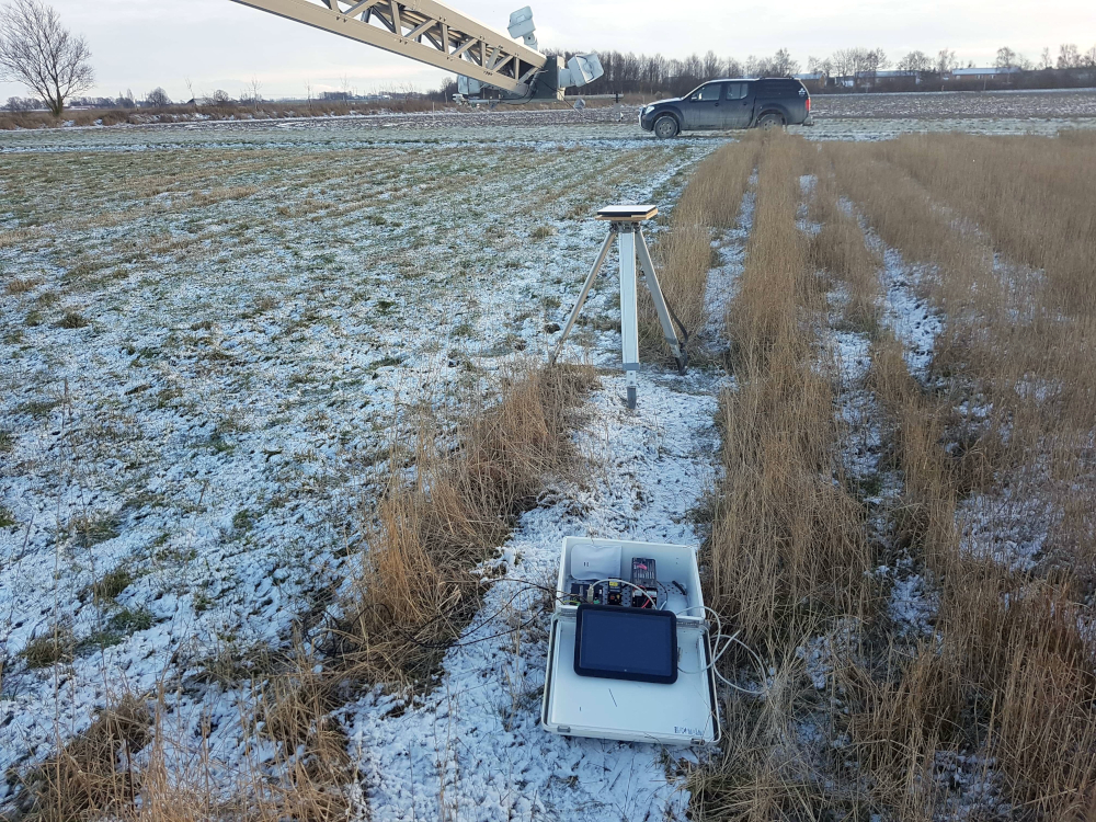 View of the phenocameras and NDVI sensors placed in the tower and the calibration equipment. Photo: Ryan Davidson.