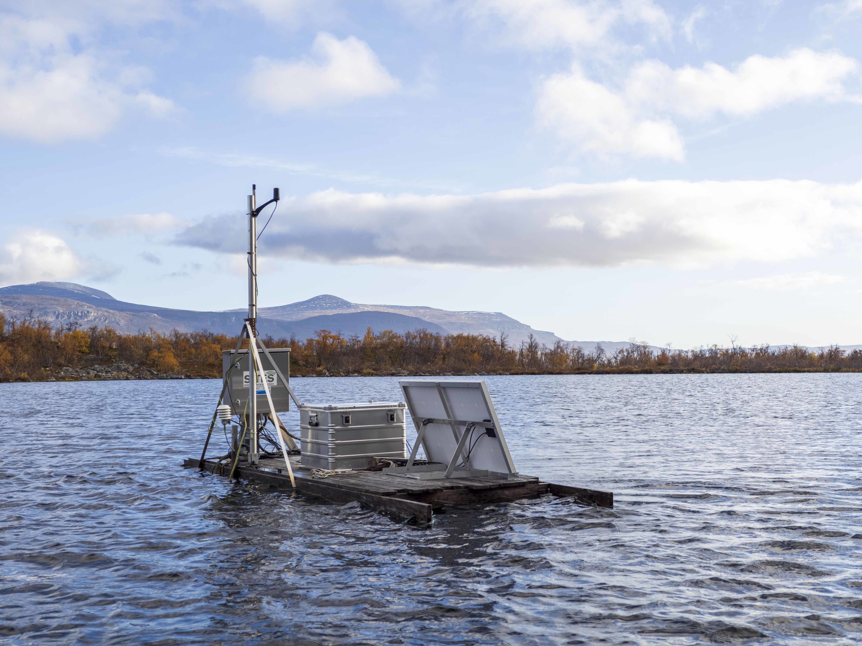 The raft in lake Ambergasjön is deployed during the ice-free period of the year to continuously collect measurements for SITES (Photo: Melina Granberg).